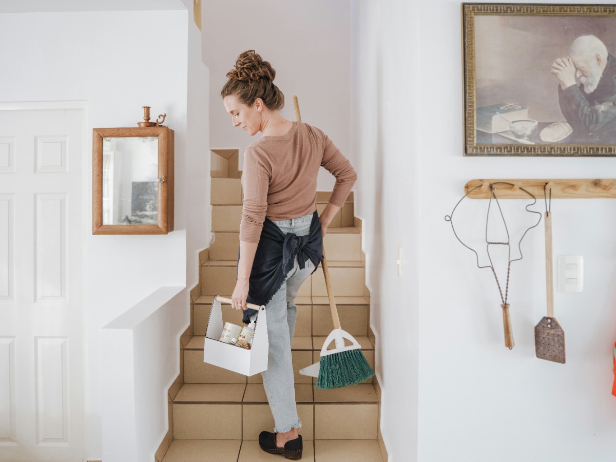 House-cleaning professional cleaning a home